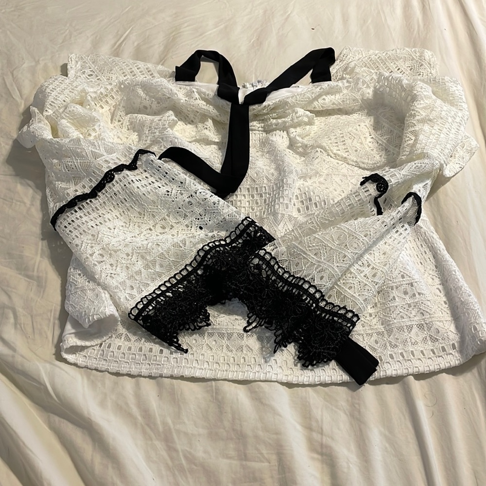 White and black off the shoulder blouse from Venus